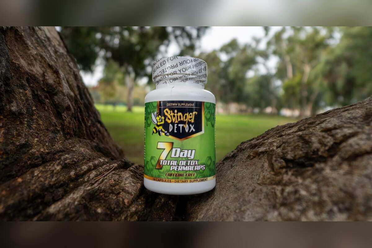 Stinger 7 Day Detox Permacaps bottle on a tree root