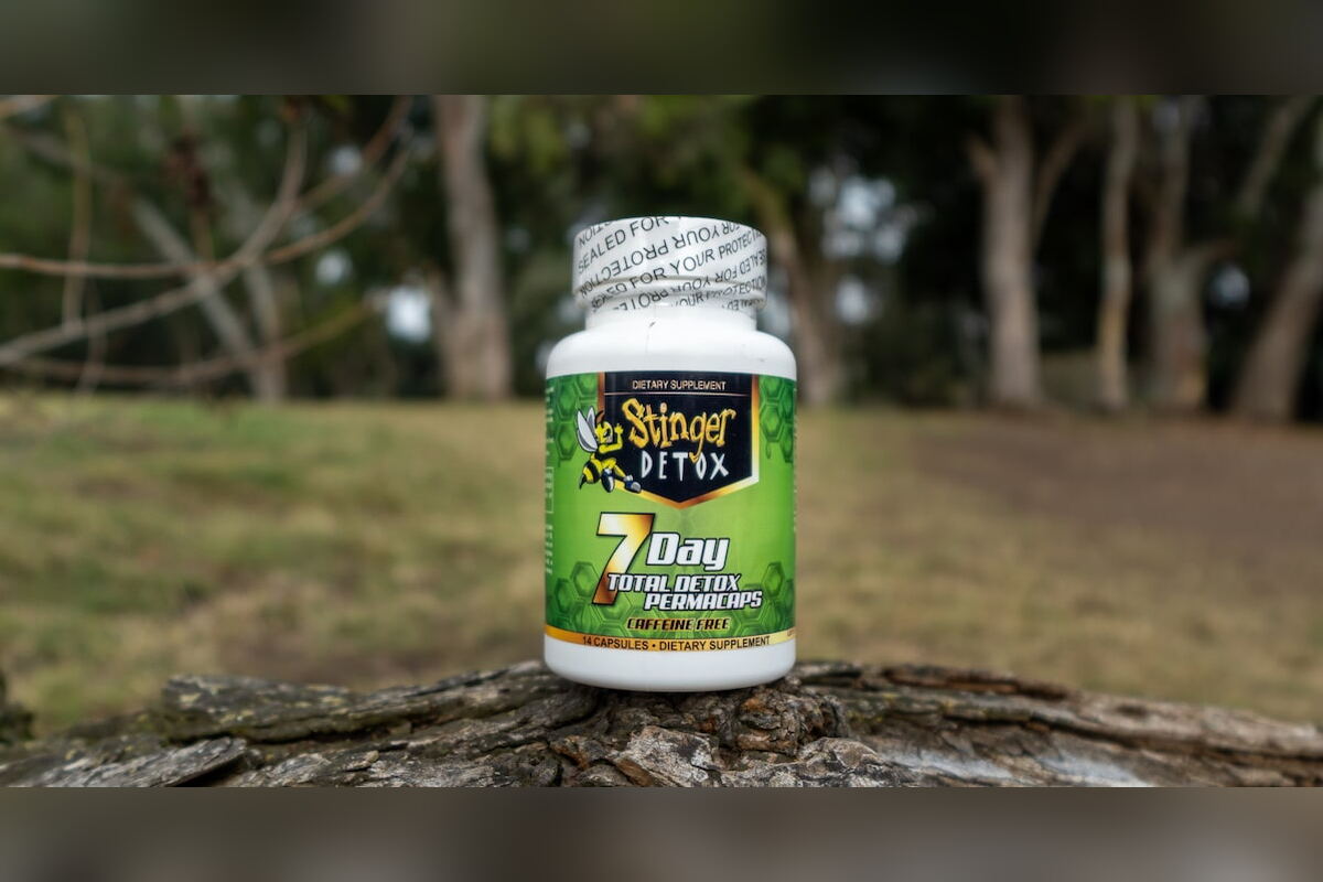 Stinger 7 Day Detox bottle in a park