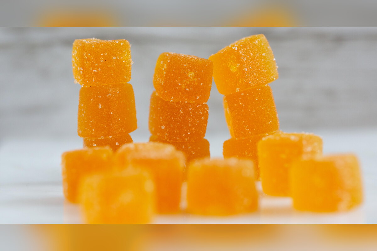 Stack of orange CBD gummy cubes
